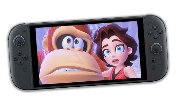 Mario, wearing his signature red hat and overalls, is leading a race in a go-kart on a steep, sandy, canyon-like racetrack. The track curves sharply to the left, marked by red chevron signs. Other characters from the Mario Kart universe follow closely behind. The background features rock formations, desert-style billboards, and a bright blue sky with scattered clouds.