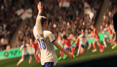 A football player wearing a white number 18 shirt raises a hand to supporters after a match, with teammates and fans celebrating in the background.