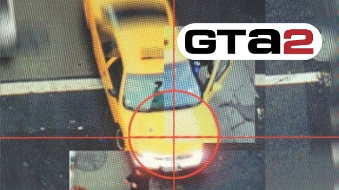 Top-down view of a yellow taxi, representing the futuristic and chaotic tone of Grand Theft Auto II, with the GTA2 logo prominently displayed in the corner.
