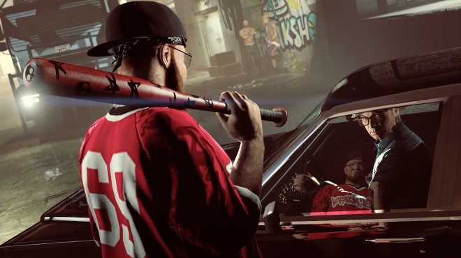 A man in a red jersey holding a baseball bat confronts two men inside a car in a dark alley. One man in the car looks back cautiously. Graffiti covers the alley walls, creating a tense urban scene from GTA Online.