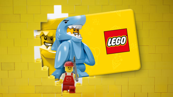 LEGO minifigures emerging from a yellow LEGO wall with a LEGO Gift Card displayed behind them